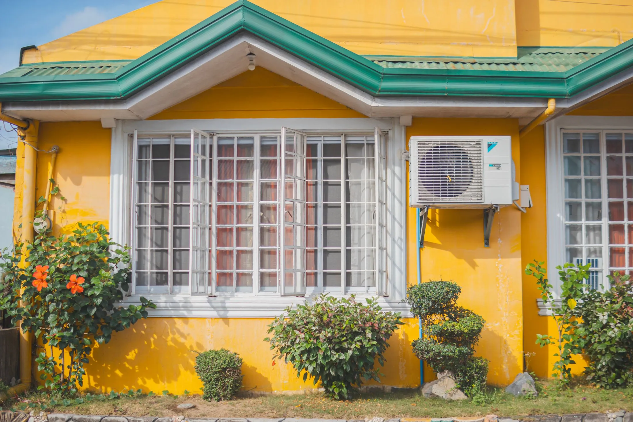 Home exterior with an air conditioning unit